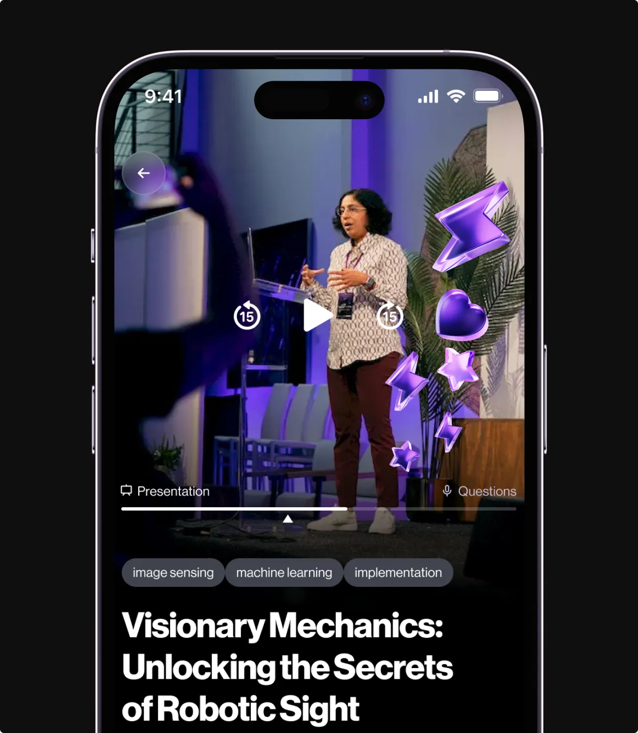 Phone playing a live talk video titled Visionary Mechanics Unlocking the Secrets of Robotic Sight