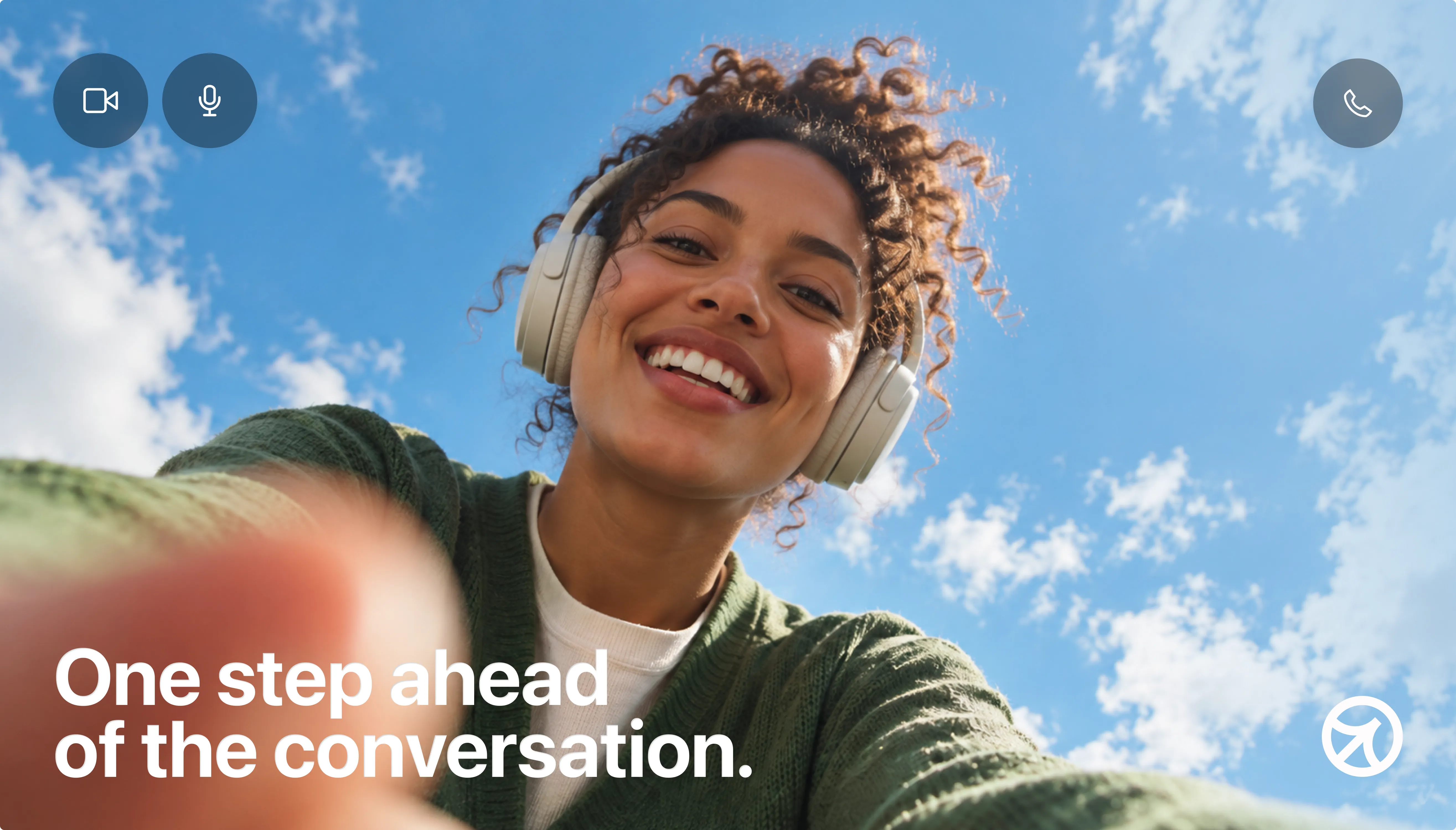 A person on a video call under the line “One step ahead of the conversation”