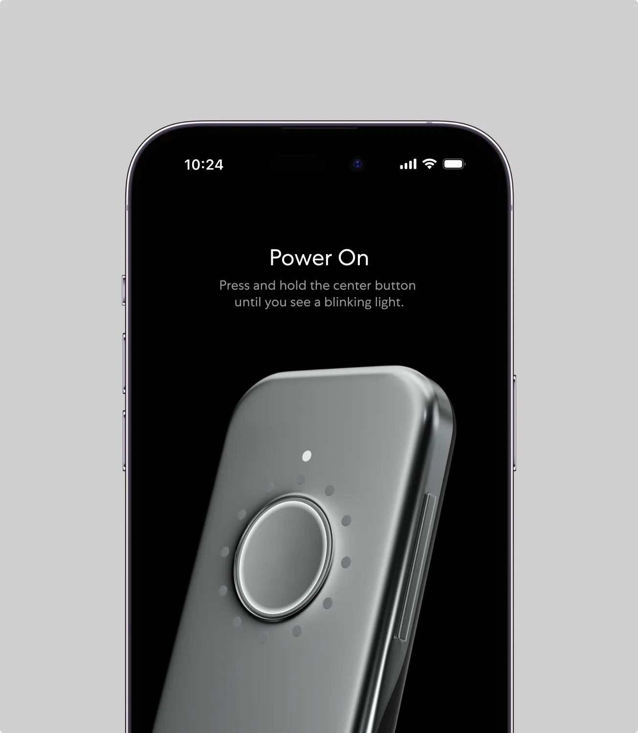 Phone showing Power On — Press and hold the center button until you see a blinking light — with the stethoscope, on light gray