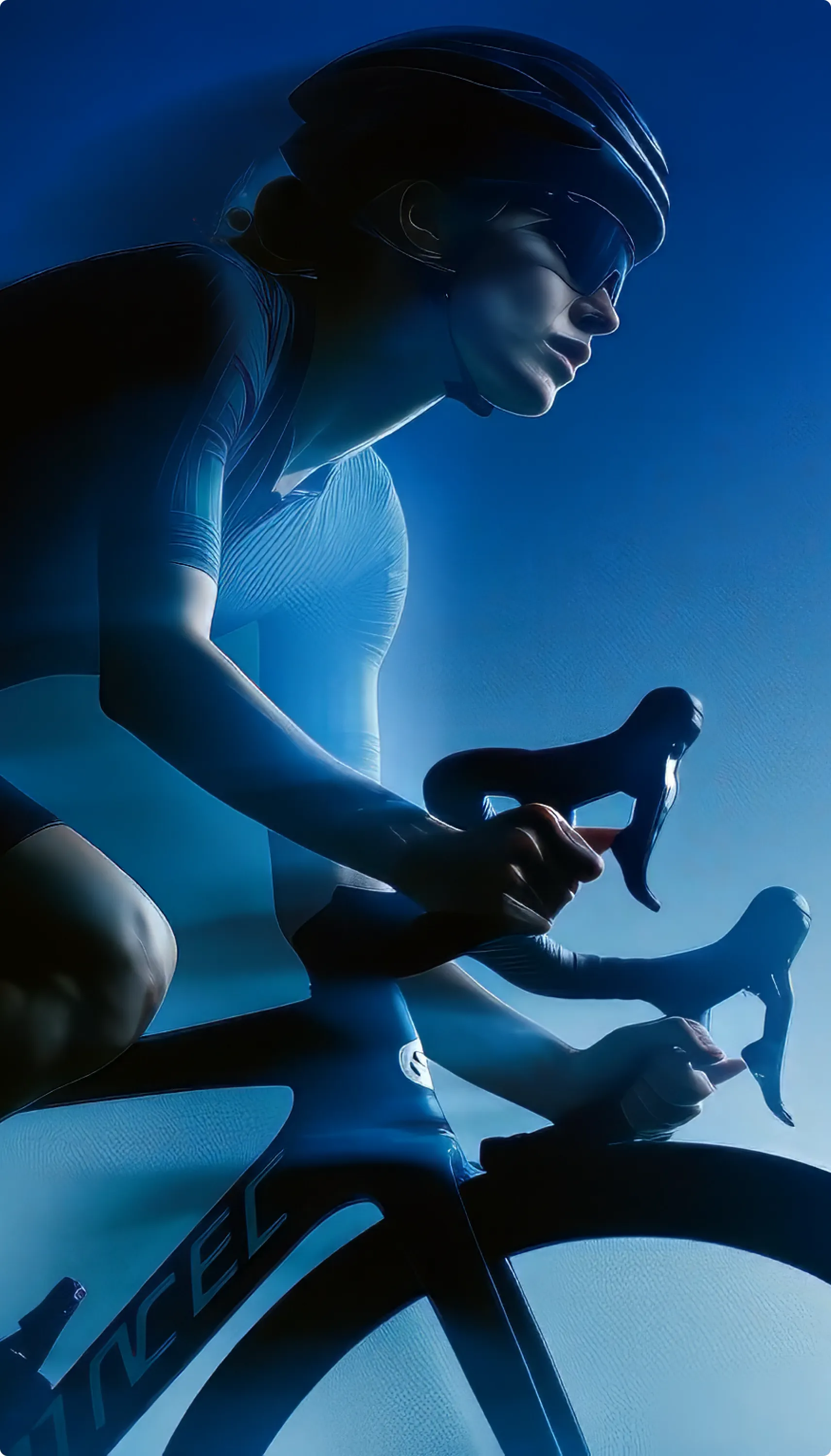 Cyclist on a road bike, shot in hard blue light