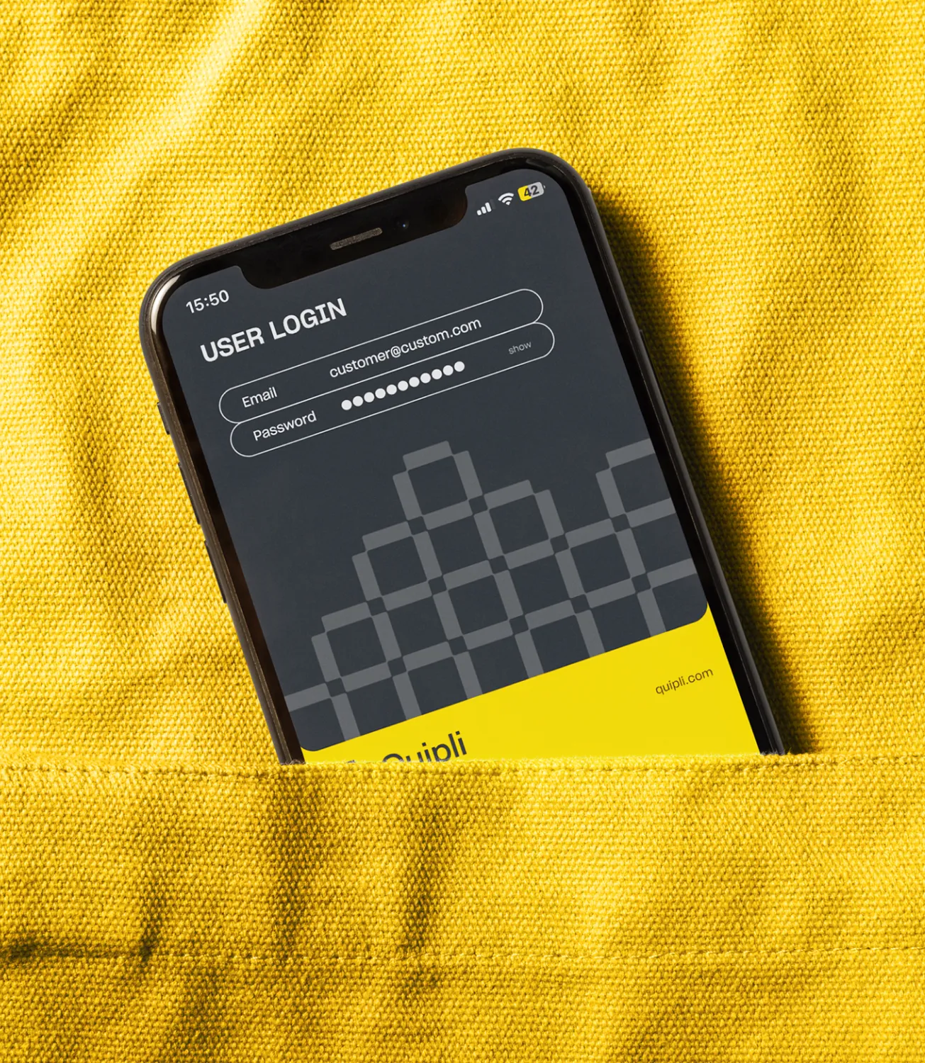 Smartphone in a yellow fabric pocket showing the Quipli user login screen