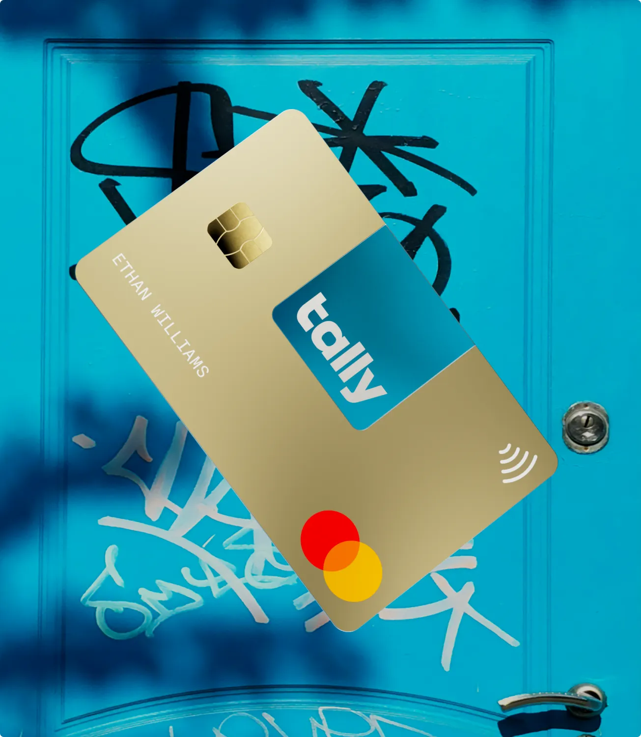 Beige Tally payment card on a blue graffiti wall