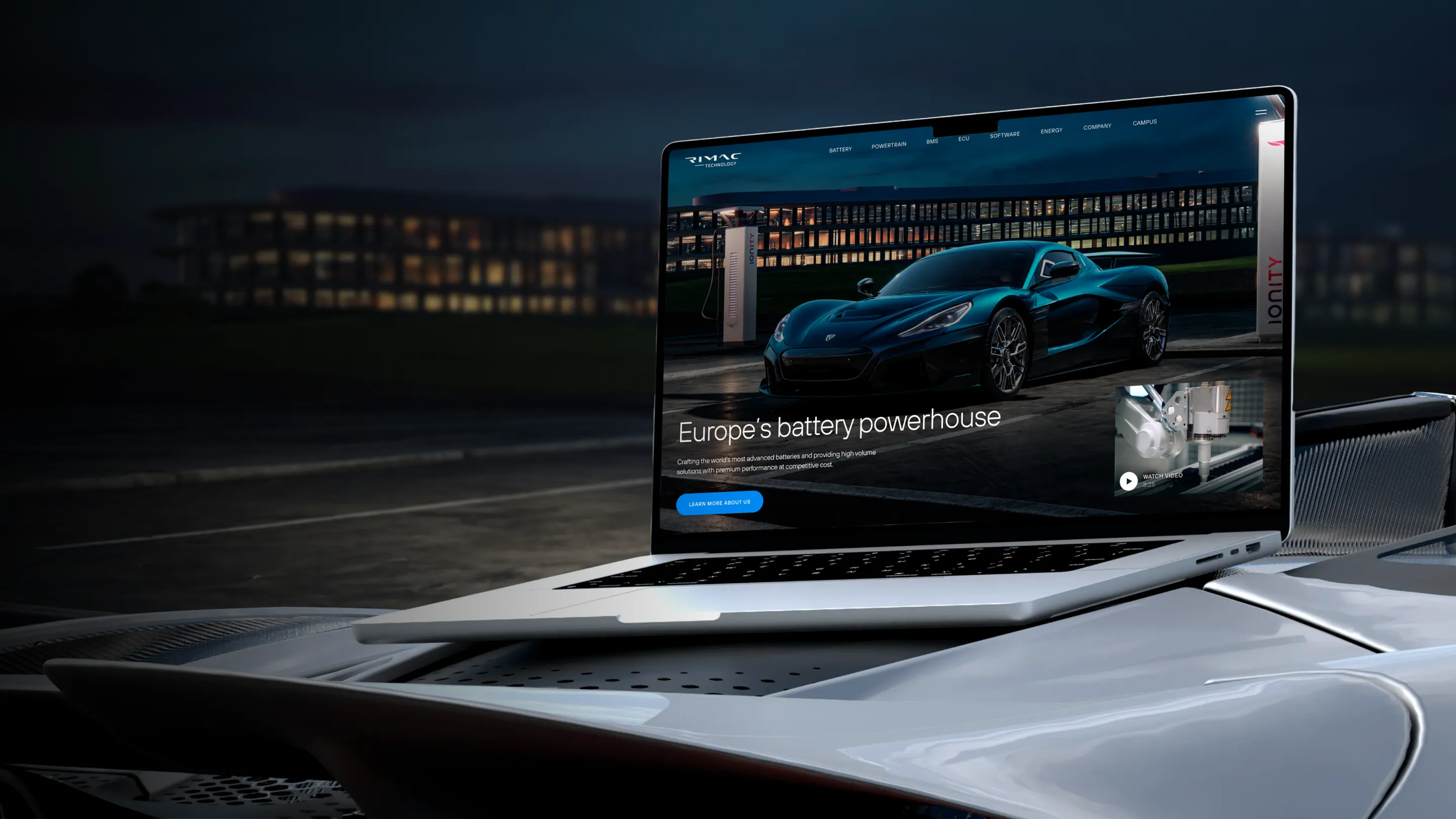 Rimac Technology website on a laptop resting on a hypercar at night